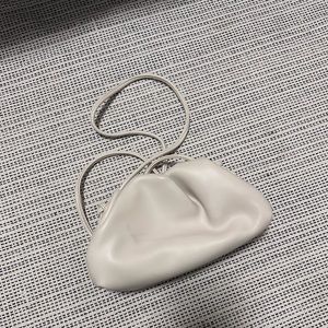 Bottega inspired cloud clutch